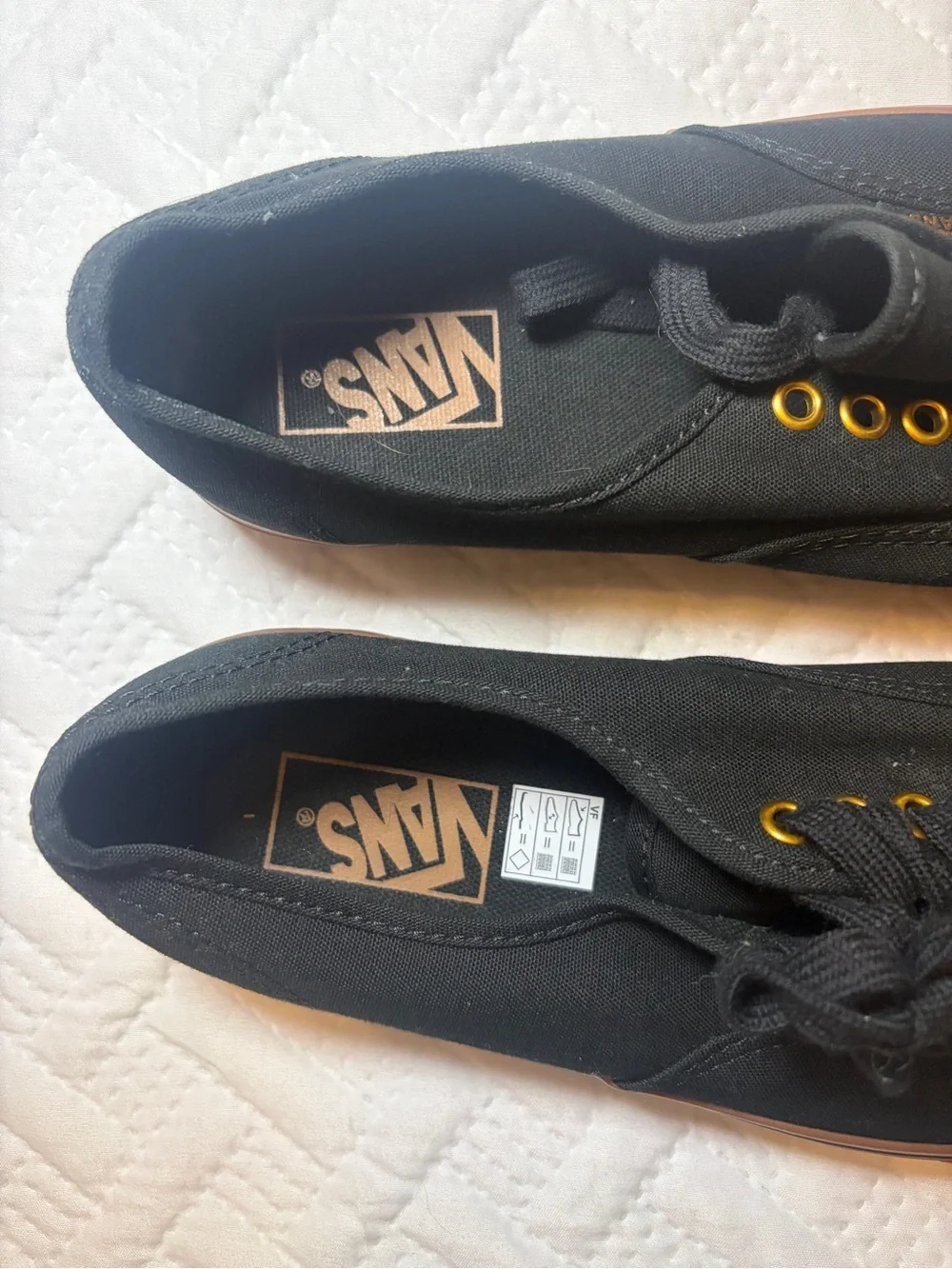 Vans | NWOT Black Canvas Skate Sneakers with Gum Sole and Gold Eyelets Unisex